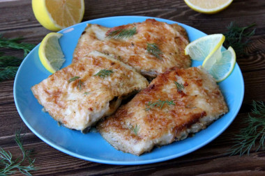 Fried flounder in pan