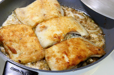 Fried flounder in pan