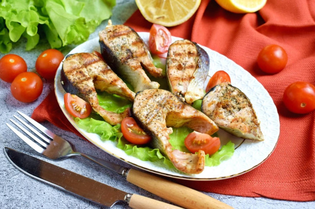 Grilled salmon in a frying pan