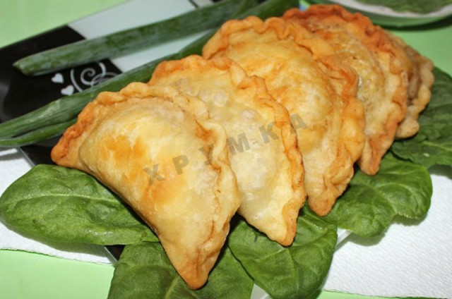Meat pies fried with sour cream milk and water