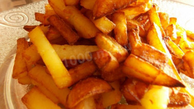 Potatoes fried in olive oil