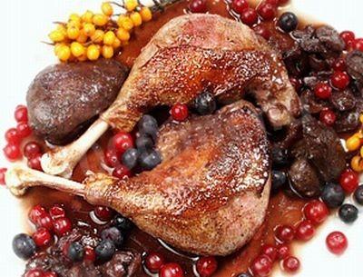 Roast duck with bacon onions apples cranberries