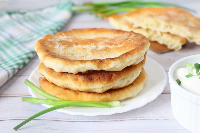Fluffy flatbreads on kefir in a frying pan