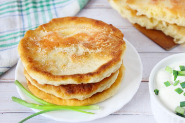 Fluffy flatbreads on kefir in a frying pan