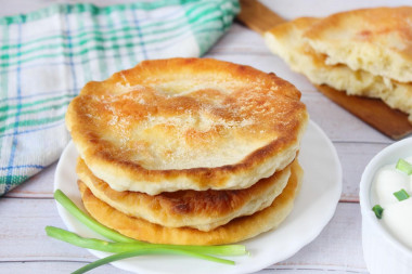 Fluffy flatbreads on kefir in a frying pan