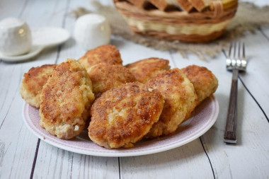 Juicy minced meat cutlets classic in a frying pan