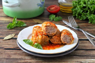 Cabbage rolls made from fresh cabbage with meat in a saucepan