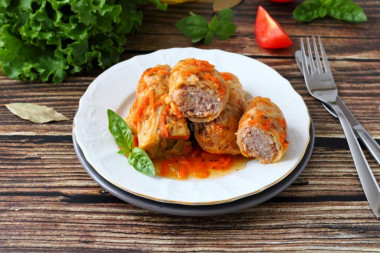 Cabbage rolls made from fresh cabbage with meat in a saucepan