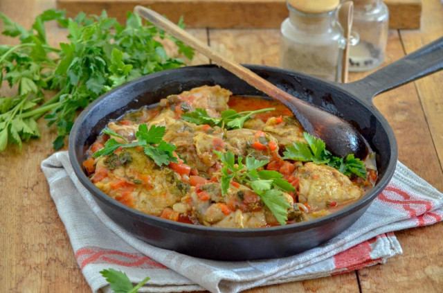 Classic Georgian chicken chakhokhbili in a frying pan