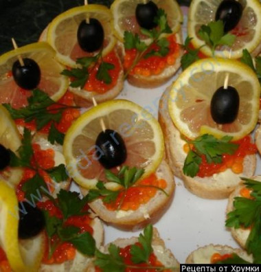 Sandwiches with red caviar Boats