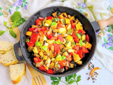 Eggplant stewed with vegetables in a frying pan