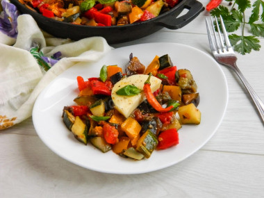 Eggplant stewed with vegetables in a frying pan