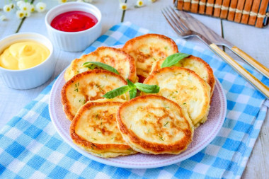 Pancakes with cheese in a frying pan