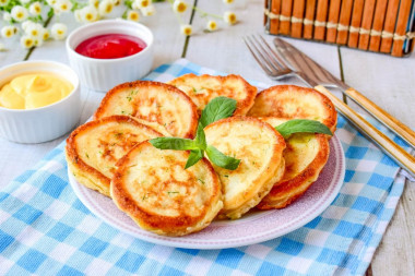 Pancakes with cheese in a frying pan