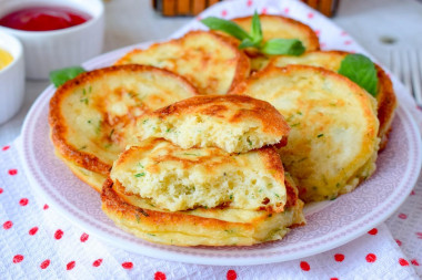 Pancakes with cheese in a frying pan