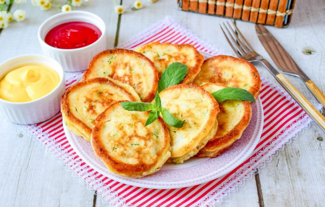 Pancakes with cheese in a frying pan