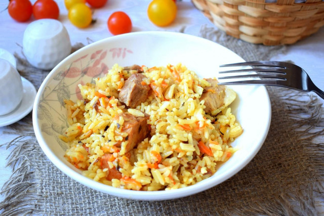 Pilaf with pork in a slow cooker