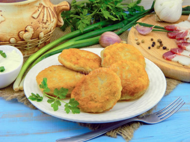 Potato pancakes with minced meat in a frying pan