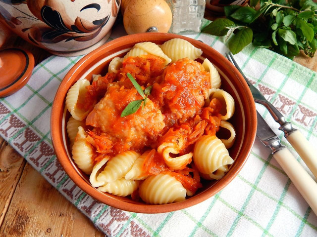 Meatballs in tomato sauce in a frying pan