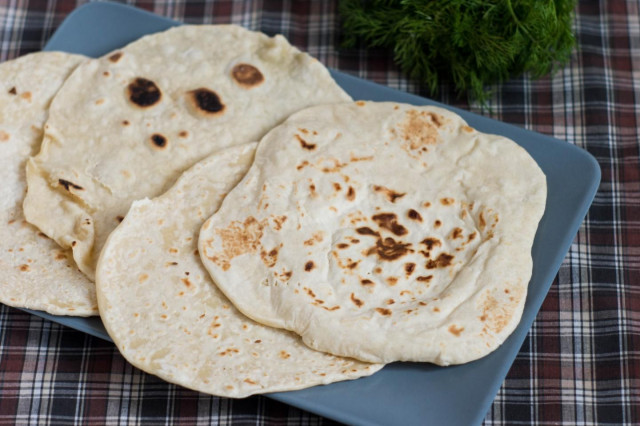 Tortillas made of water and flour in a frying pan