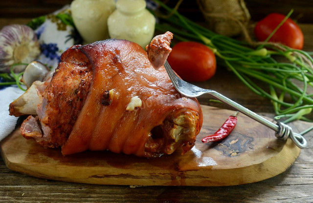 Pork knuckle in the sleeve baked in the oven