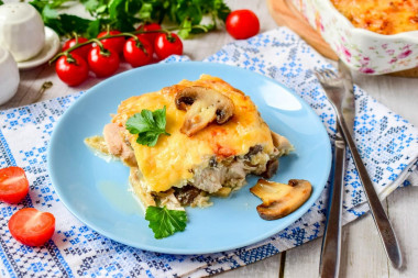 Mushrooms in the oven with cheese and chicken