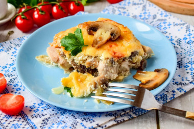 Mushrooms in the oven with cheese and chicken