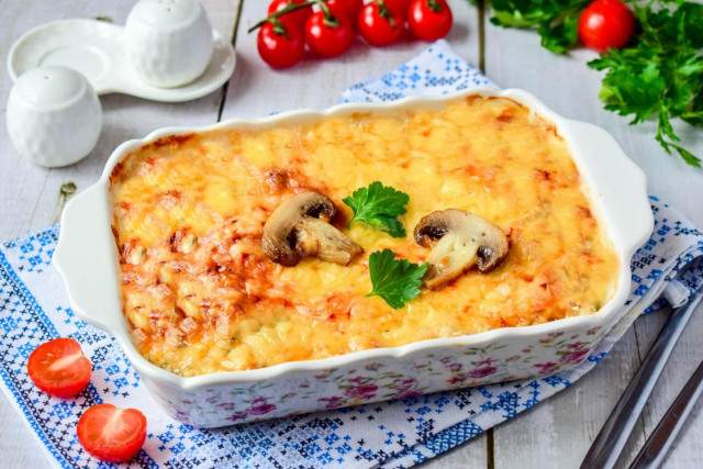Mushrooms in the oven with cheese and chicken