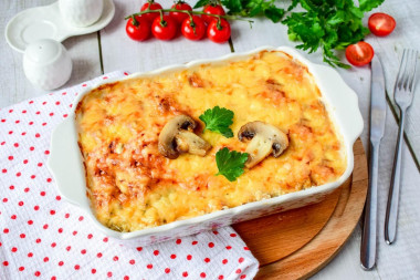 Mushrooms in the oven with cheese and chicken