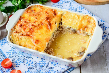 Mushrooms in the oven with cheese and chicken