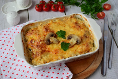 Mushrooms in the oven with cheese and chicken