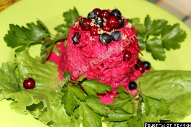 Raw beetroot salad with walnuts and prunes